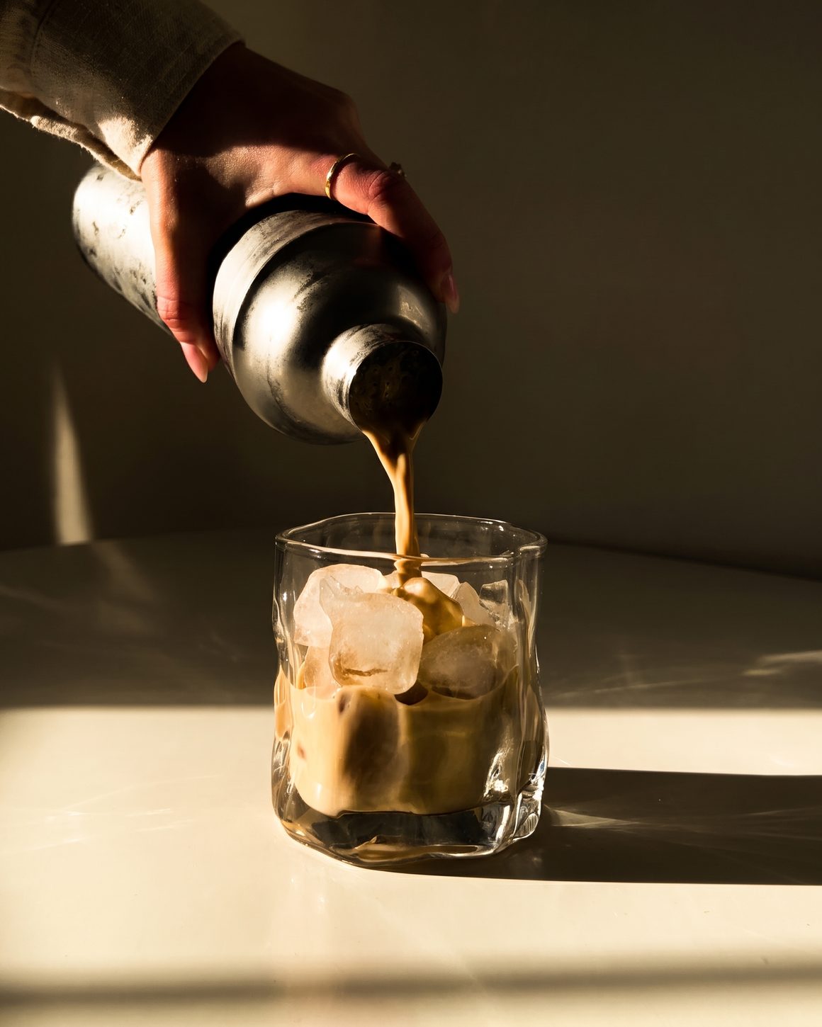Iced latte being poured